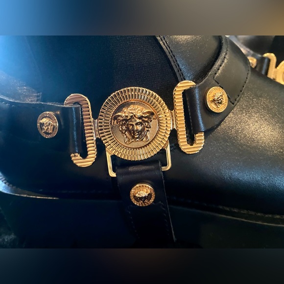 Versace. Medusa-plaque ankle boots.